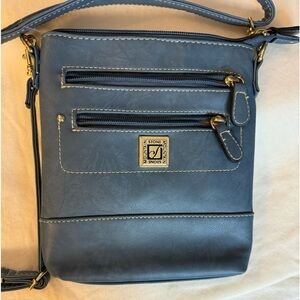 Vintage cross body handbag with pockets